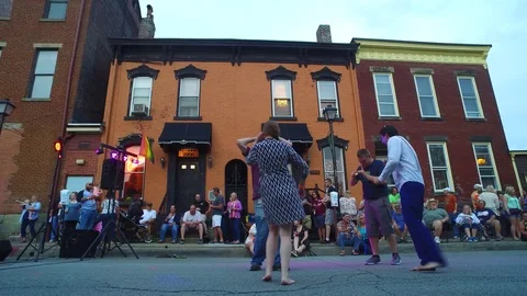 WHEELING WEST VA, COUPLE DANCING IN STREET HAVING FUN Stock Footage 112805765