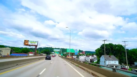 WHEELING WEST VA, DRIVING SHOT, 70 EAST OVER BRIDGE INTO WHEELING Stock Footage 110926771