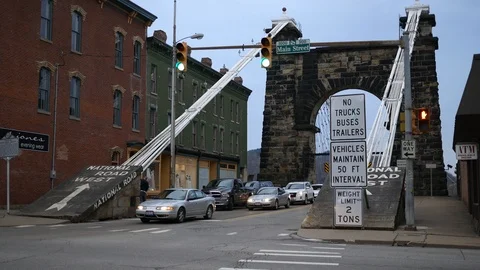 WHEELING, WV - Circa April 1 2019 - Establishing shot of a bridge in Wheeling, W Stock Footage 105553343