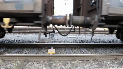 Wheels and bogie of a slow moving freight train seen up close 02 Stock Footage 105848667