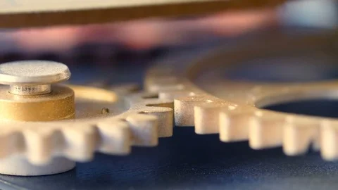 Wheels beating time: clock wheels mechanism rolling- macro Stock Footage 85596807