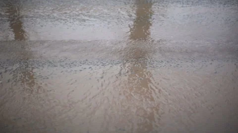 The wheels of the car passing on wet road Stock Footage 61504844