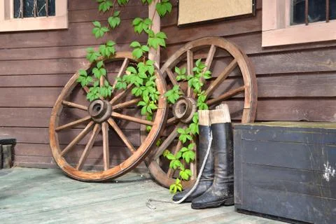 Wheels from cart with boots Stock Photos