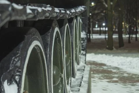 Wheels with caterpillars on a blurred background Stock Photos
