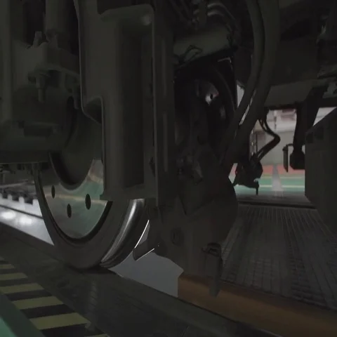 Wheels on chassis of train wagons at workshop in factory Vídeo Stock 69481996