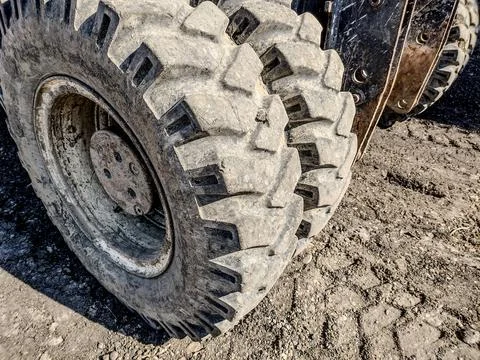 The wheels of an excavator Stock Photos