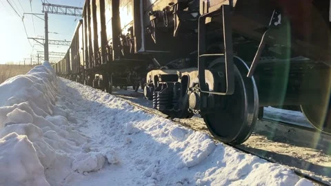 Wheels of a freight train leaving the station slowly.  Stock Footage 148231740