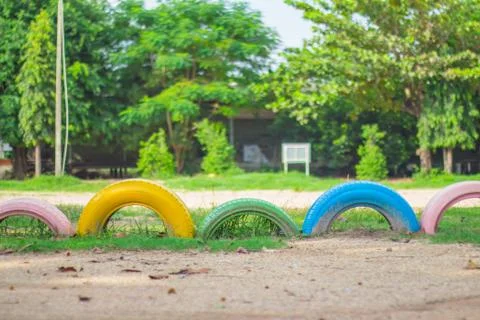 Wheels on the lawn. Stock Photos
