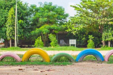 Wheels on the lawn. Stock Photos