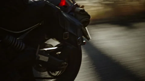 Wheels on a motorcycle while being ridden Stock Footage 279269165