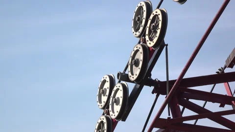 Wheels moving wire on cable car track 4k Видео 148005886