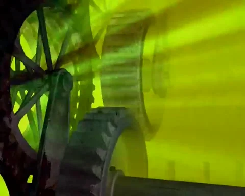 Wheels moving in yellow rays emitting Stock Footage 255921214