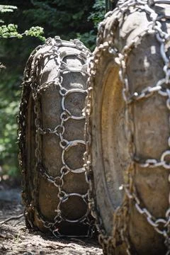 Wheels with mud chains Stock Photos