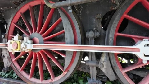 Wheels from an old abandoned steam engine. Rusty steam train wheel Stock Footage 288744738