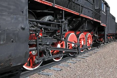 The wheels of an old steam engine Stock Photos