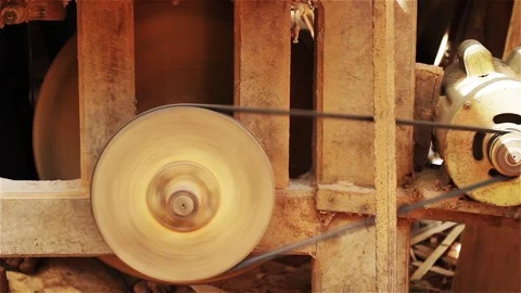 Wheels of an Old Thickness Planer Machine are Switched On in Carpentry Workshop. Video stock 96020923