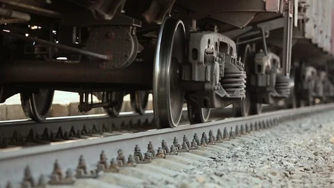 The wheels of old train on the railway track passing by camera. Close up shot Stock Footage 106298637