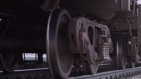 The wheels of old train on the railway track passing by camera. Close up shot Stock Footage 106298978