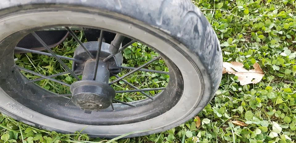 Wheels on a pram Stock Photos