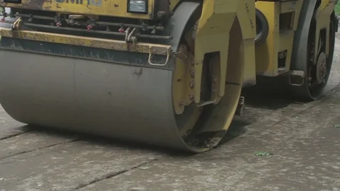Wheels of road roller close up during flattening way. Stock Footage 76999870