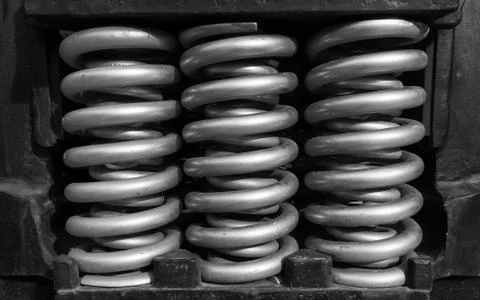 Wheels of a spring train. Spring amortisation mechanism of chassis train Stock Photos