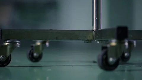 Wheels of a stand rolling past Video stock 85215708