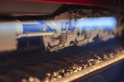 Wheels of a toy train on rails Stock Photos