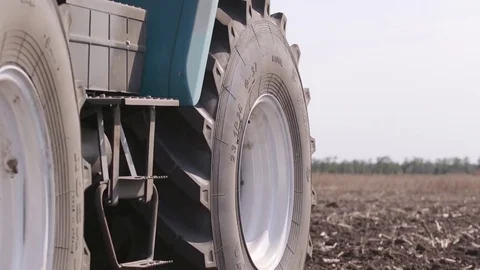 Wheels of a tractor close-up Stock Footage 82938902
