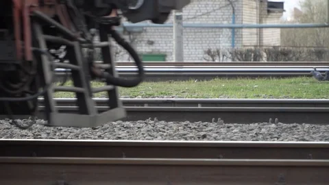 Wheels of a train moving on rails slow motion Stock Footage 106221916