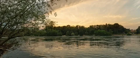 When evening approaches on the river bank Stock Footage 299869390