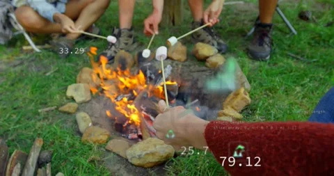When hand in red sweater nearing flames, AR HUD appearing, measuring CO2, Stock Footage 334182542