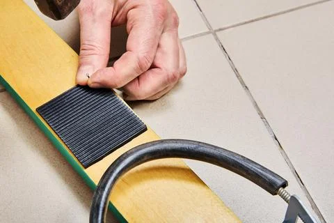 When installing universal semi-rigid ski cable bindings with free heel, the.. Stock Photos