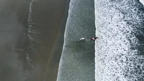When land meets sea: teamwork has no limits. Stock Footage 314393587