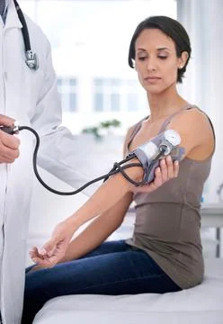 When last have you checked your blood pressure. Cropped shot of a doctor Stock Photos