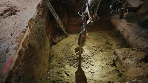When laying the foundation of the building, equipment for drilling the Stock Footage 263844211