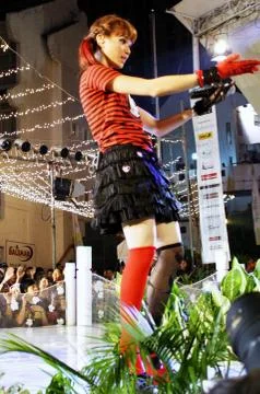 When a member of THE VIRGIN is singing at the Atrium Model Award 2010 Stock Illustration