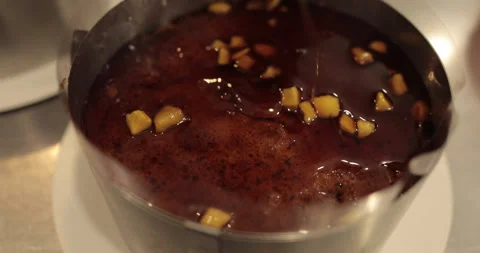 When preparing a chocolate cake by a professional confectioner Stock Footage 251723455