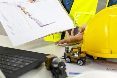 When a project is being built, construction and system engineers provide co.. Stock Photos