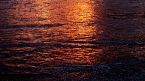 When the sun sets on the beach Stock Photos