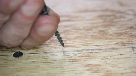 When tightening the screw drops Stock Footage 58642150