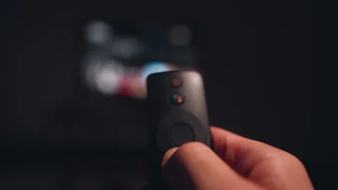 When using the remote control to change channels on a broadcasting platform Stock Footage 249469755