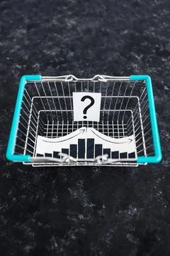 When will inflation go down. shopping basket with graph showing prices goin.. Stock Photos