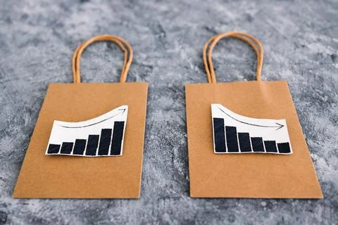 When will inflation go down. shopping bags with graph showing prices increa.. Stock Photos