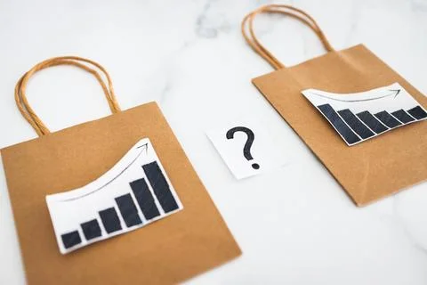 When will inflation go down. shopping bags with graph showing prices increa.. Stock Photos