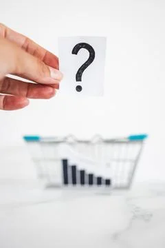 When will inflation go down. shopping basket with graph showing prices drop.. 写真素材