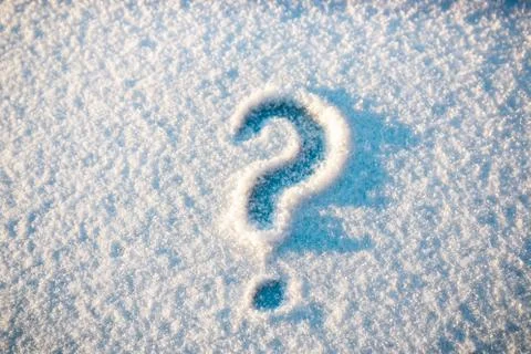 When will it stop. question mark on snow Stock Photos