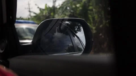 When you are going to change lanes, then you must look in the mirror Stock-Footage 305029382