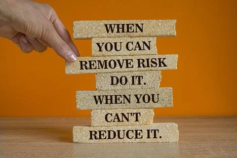 When you can remove risk, do it. When you can't, reduce it. slogan Stock Photos