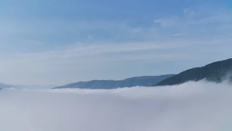 Where The Clouds Meet The Mountains. Stock Footage 314978714