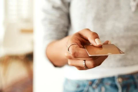 Where do I pay. Cropped shot of an unrecognizable businesswoman standing alone Stock Photos